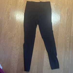Athleta Black Salutation Stash Tight Leggings